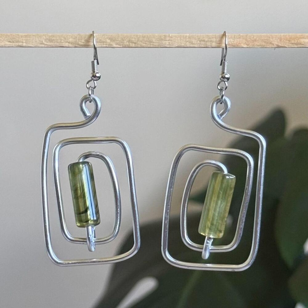 handmade silver wire spiral earrings with jade green colored tube beads